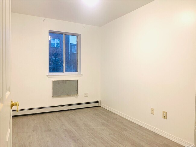 Building Photo - 22-15 119th St