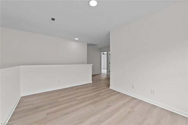 Building Photo - Earn Wealth While Leasing - Like a Homeown...