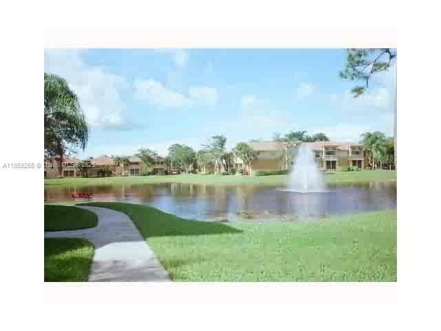Building Photo - 4879 Via Palm Lakes
