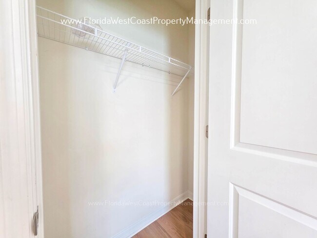 Building Photo - MOVE IN READY ! 4 BEDROOM/2 BATH! TILE- LVP THROUGHOUT! LAWN MOWING INCLUDED!