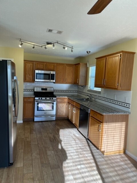 Kitchen, granite countertops and stainless steel appliances - 29015 Waltham St