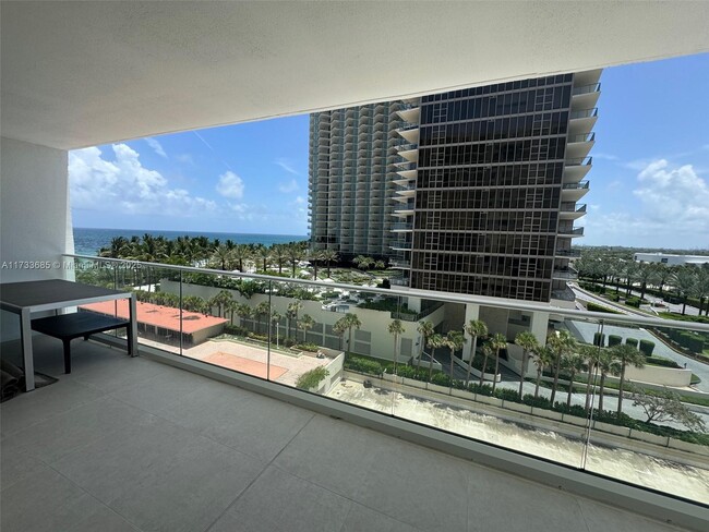 Building Photo - 9801 Collins Ave