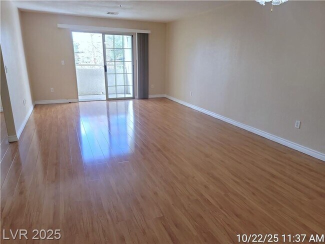 Building Photo - Inviting Green Valley Condo with Dual Balc...