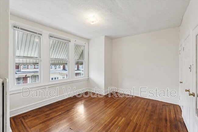 Building Photo - 6227 Addison St