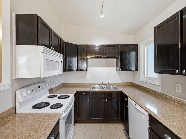 Building Photo - Updated 3 Bed Home with Vaulted Ceilings, Solar Panels & Large Corner Lot- $200 Lease Sign On Bonus!