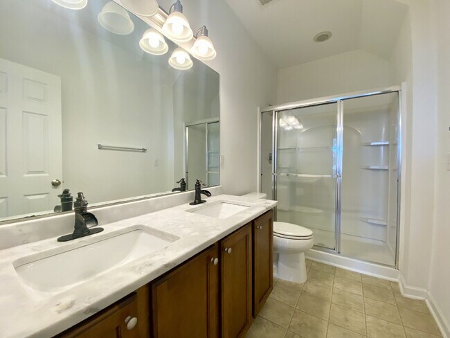 Building Photo - Spacious, Four Bedroom Townhouse With a View!