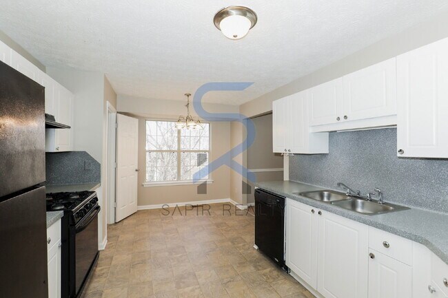 Building Photo - Move in before February 28th and choose your reward: a $250 Amazon Gift Card or a 55" Smart TV!