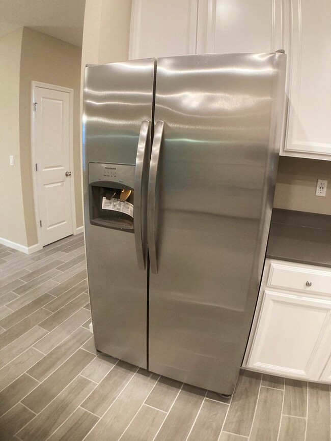 Building Photo - Your Private Escape with High-End Finishes...
