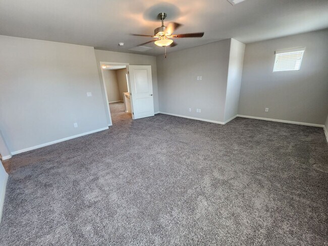 Building Photo - A Fairly New Home with 5 Bedrooms in a gated community