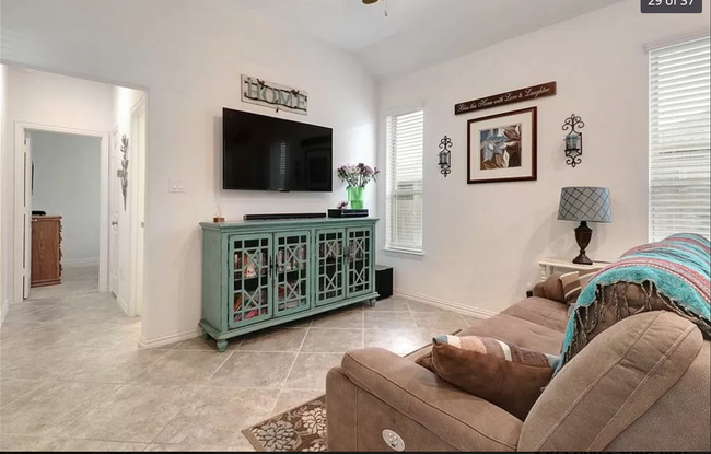 TV stand on the wall - 2109 Sauterne Dr