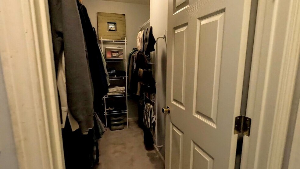 The master bedroom features a very large walk-in closet with built-in organizers. - 424 Commerce Ave