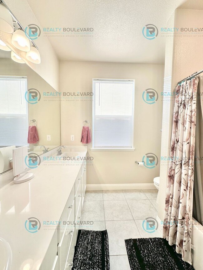 Building Photo - Welcome to your dream home, where modern elegance meets unparalleled convenience!