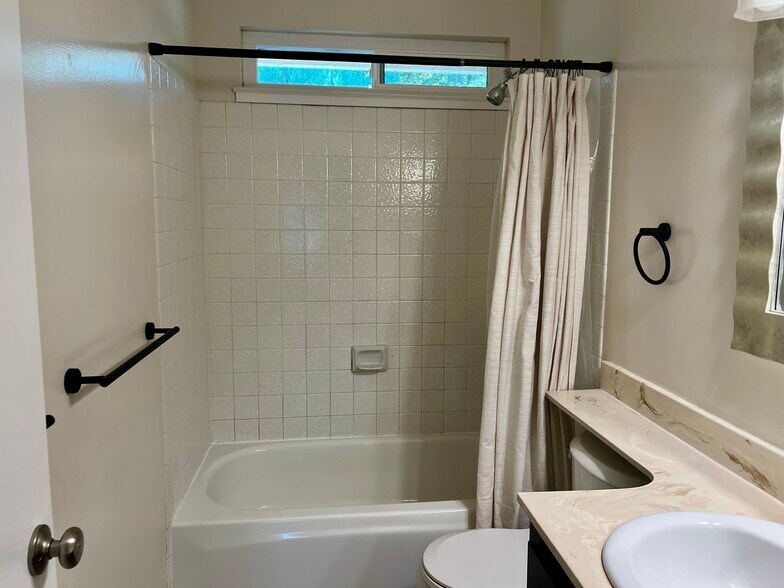 Full bath upstairs - 7520 Silvertree Ln