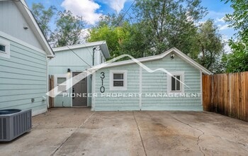 Building Photo - Cozy Colorado Springs Studio with Full Kit...