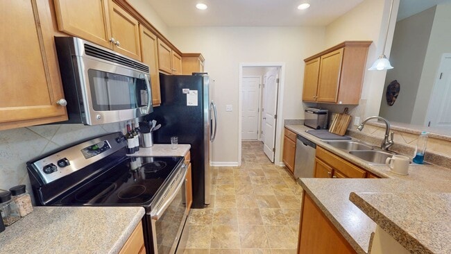 Building Photo - Stylish Two-Story in the dreamy Riverbrook...