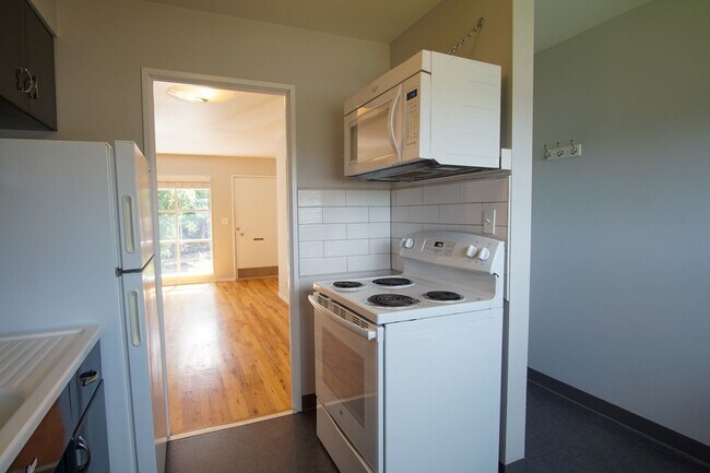 Building Photo - Fabulous Mid-Century Renovated 2Bdr w/Hardwoods, Dishwasher + Pets OK