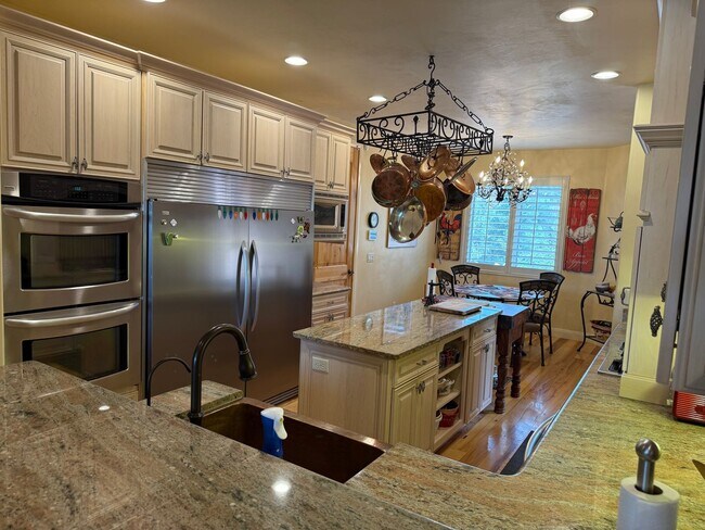 Building Photo - Truly unique and one of a kind Baker Reservoir home. Price Reduced! 3-Month Lease Option Available!