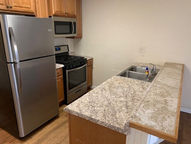 Building Photo - Updated 2BD/1BA Apartment with In-Unit Laundry + 2 Parking Spots - 1/2 Off Second Month's Rent