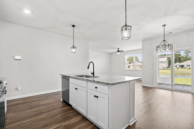 Building Photo - Modern 4BR Home with Screened Porch & Pond Views | Sun Colony, Longs SC