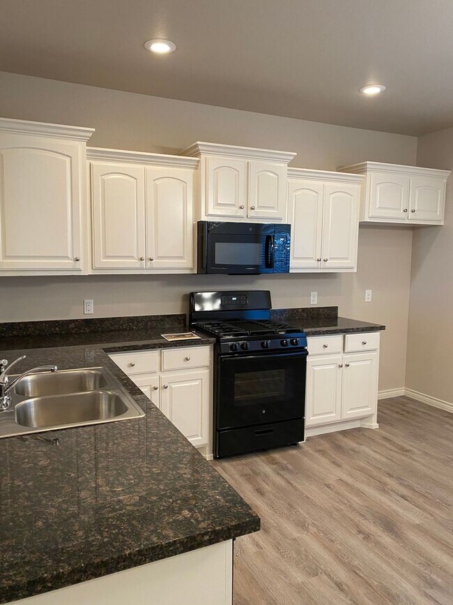 Building Photo - Beautiful Brand New Tim Roten Custom Brick...