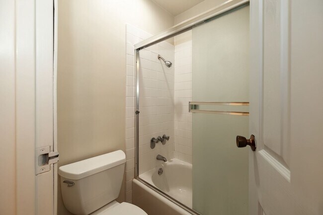 Building Photo - Peaceful Forest-View Condo with Fireplace & Private Balcony in Golden Oaks