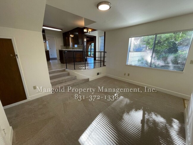 Building Photo - Beautiful 4-bed 2-bath Home with Cozy Fireplace, Front and Back Yards and Large Windows!