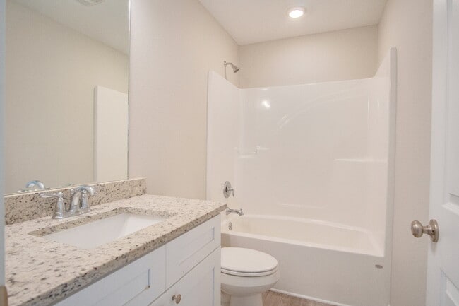 Building Photo - Modern Comfort Meets Style – Spacious 3-Be...