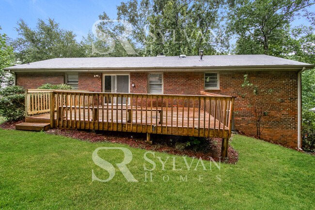 Building Photo - Welcome to this charming abode.