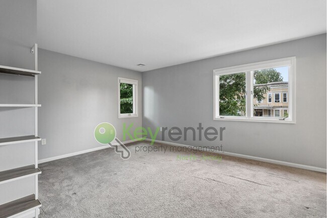 Building Photo - Spacious 2BR/2BA Duplex in Gated Community with Parking, Washer/Dryer & NYC Skyline Views