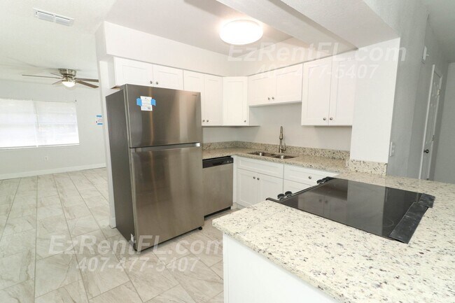 Building Photo - Remodeled 4/1.5 with Large Family Room