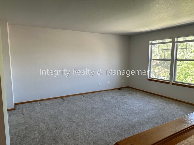 Building Photo - 3410 W 98th Dr