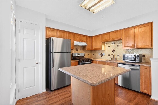 Building Photo - 3BR Townhome in Russett | 3 Levels | Walkout Basement + Deck | $2,400/mo** Beautiful 3-level town...