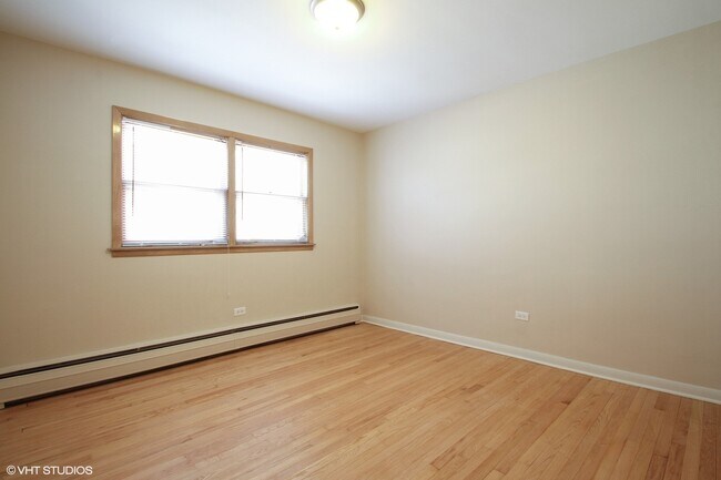Building Photo - 8317 W Summerdale Ave