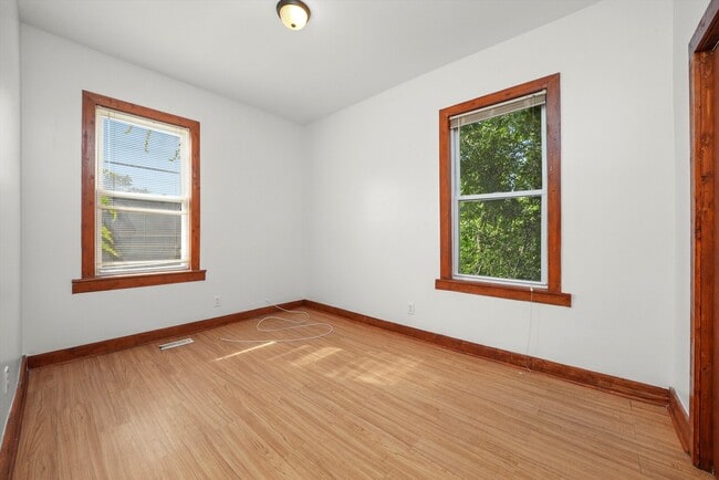 Building Photo - 6540 S Vernon Ave