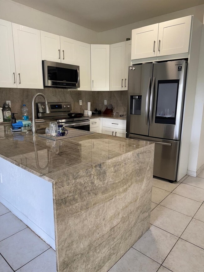 Building Photo - 5665 NW 117th Ave