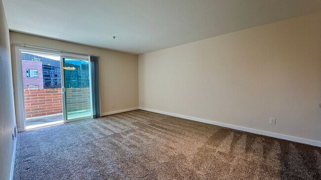 Building Photo - Largest 1-Bedroom Layout with In Unit Laundry