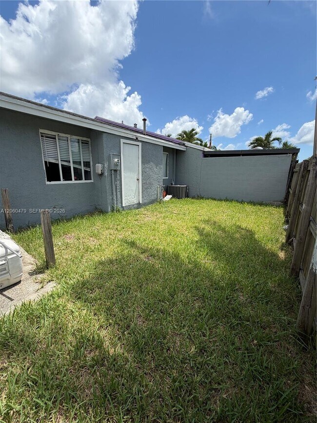 Building Photo - 18602 NW 46th Ave