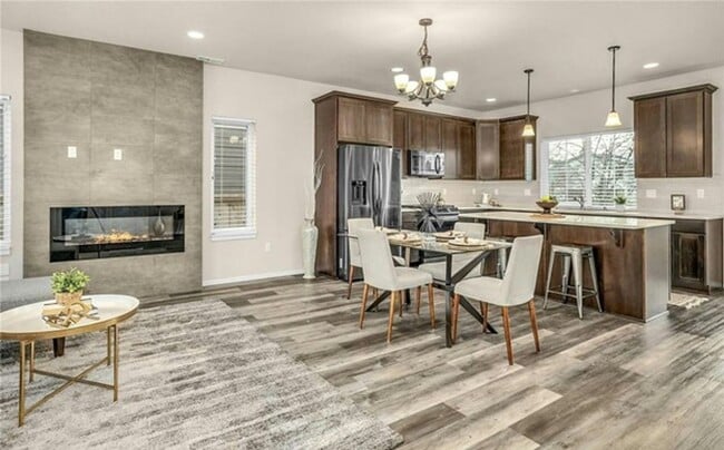Building Photo - Beautiful Almost new 3 bed +den home in Ly...