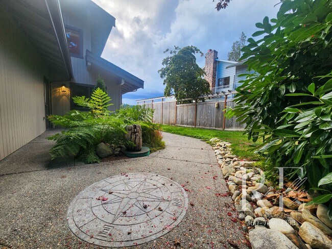 Building Photo - Waterfront Living in Indianola – Dock, Bea...