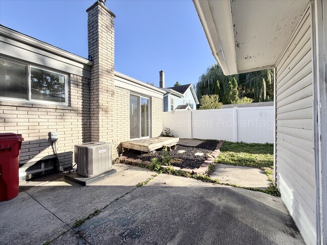 Building Photo - Solid Brick and Renovated with New Kitchen and Two Full Baths!