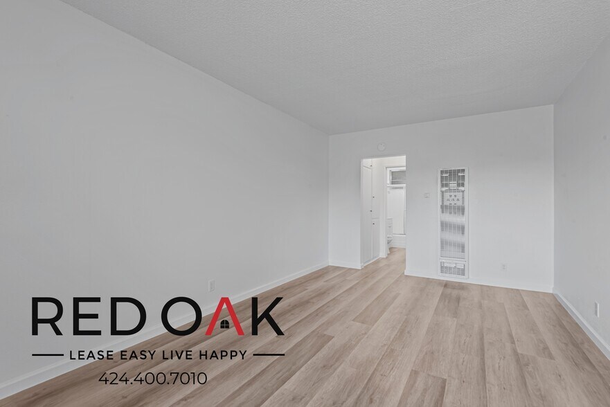 Building Photo - 15901 S Vermont Ave