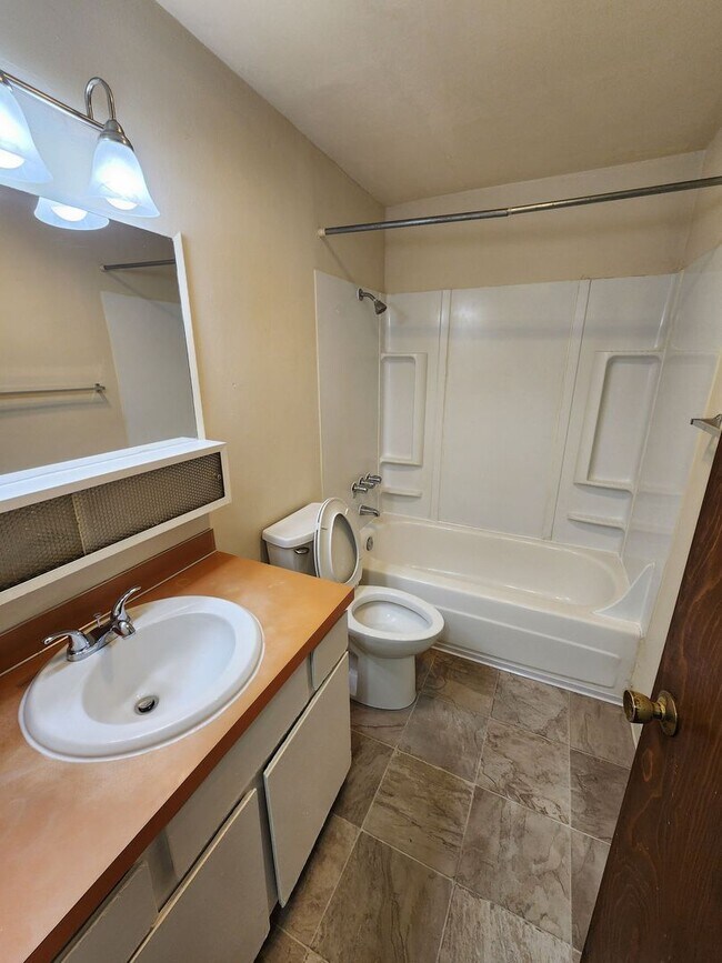 Building Photo - Month-to-Month & Lease Options Available!