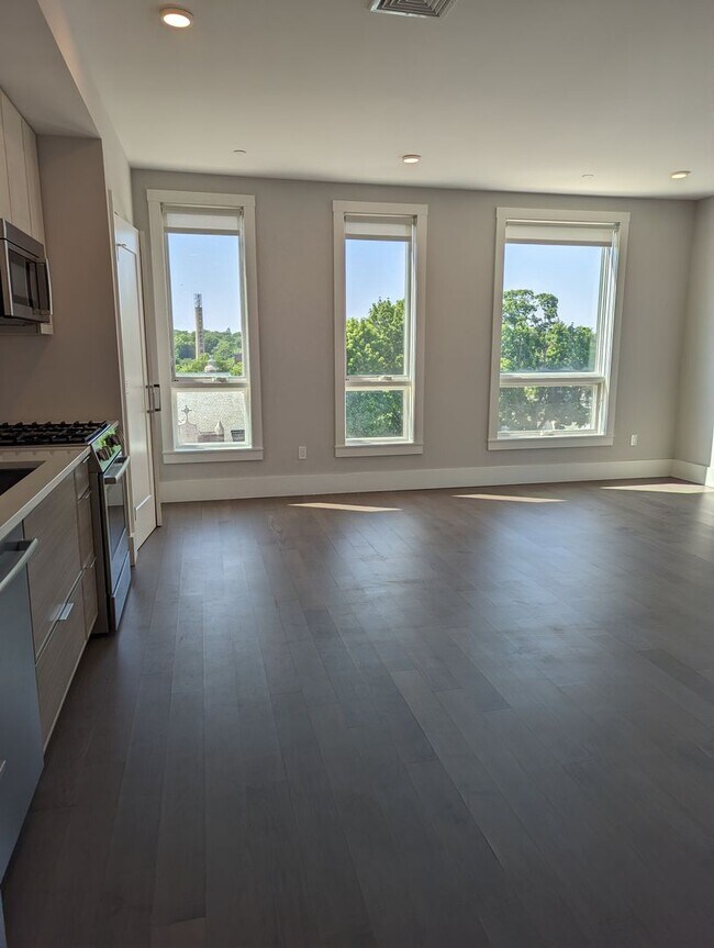 Building Photo - Jamaica Plain spacious studio w/ central a...
