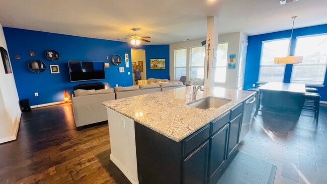 4' x 8' island with granite countertops and undermount sink - 7108 Garnet Mill Ln
