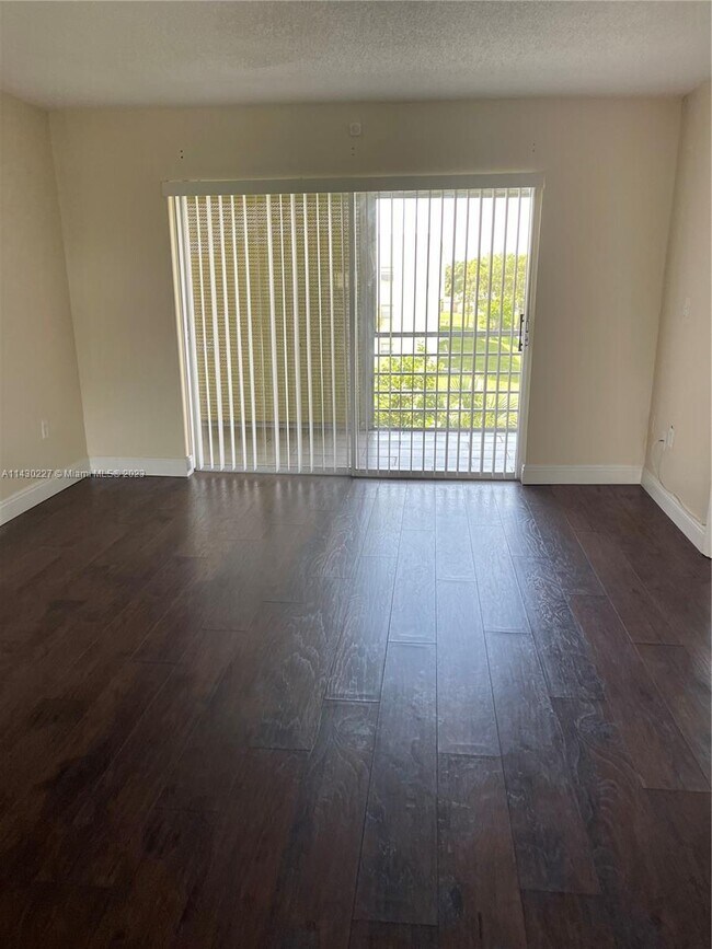 Building Photo - 8285 Sunrise Lakes Blvd