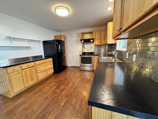 Building Photo - FOR RENT: UNFURNISHED: - Super Sweet Cottage style home in Midtown Bend.