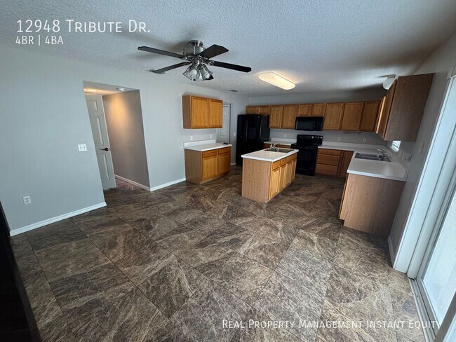 Building Photo - 12948 Tribute Dr