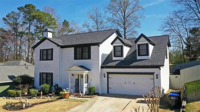 Building Photo - 4 bedroom house in Lawrenceville with cozy...