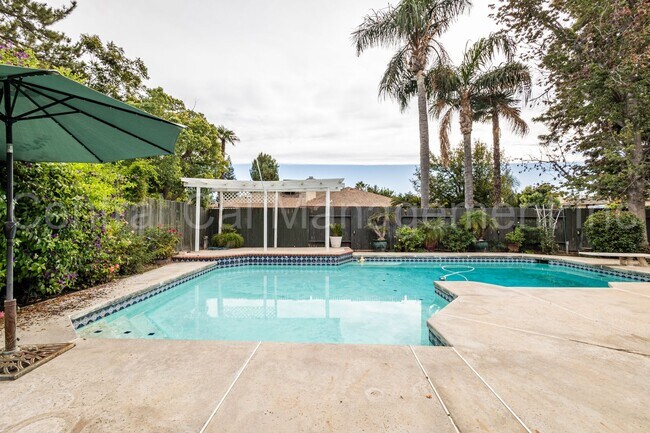 Building Photo - 4 Bedroom/2.5 Bath Home with Paid Solar and a Pool - $2950 Per Month!