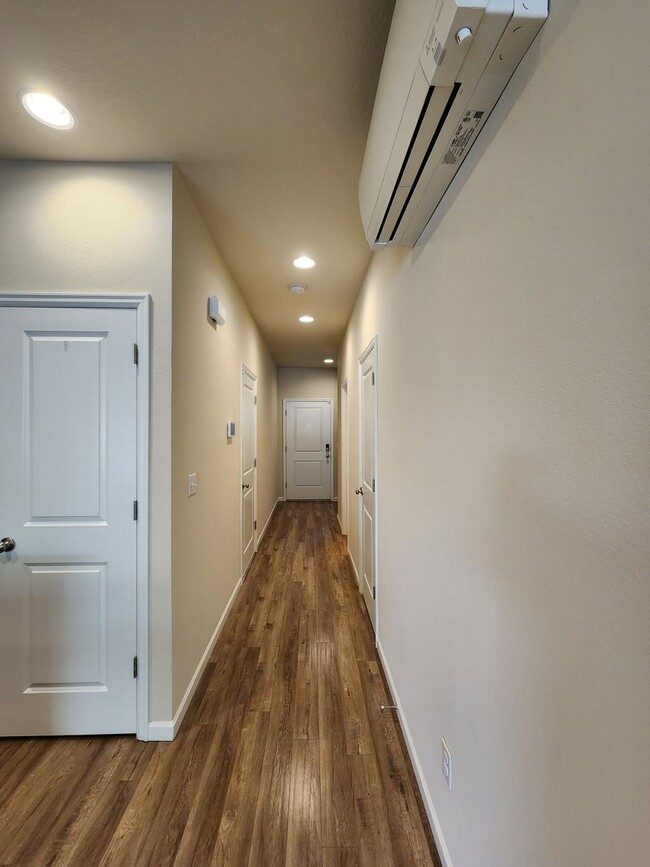 Building Photo - Pet Friendly Condo w/ A/C in Newly Develop...